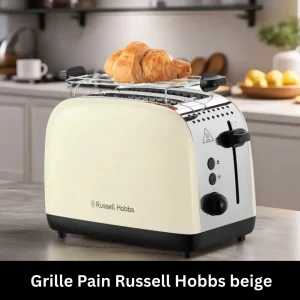 Grille pain beige avec des croissants sur un plan de travail